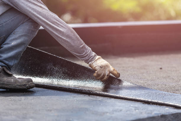 Professional Basement Waterproofing technician working in Stanwood, MI